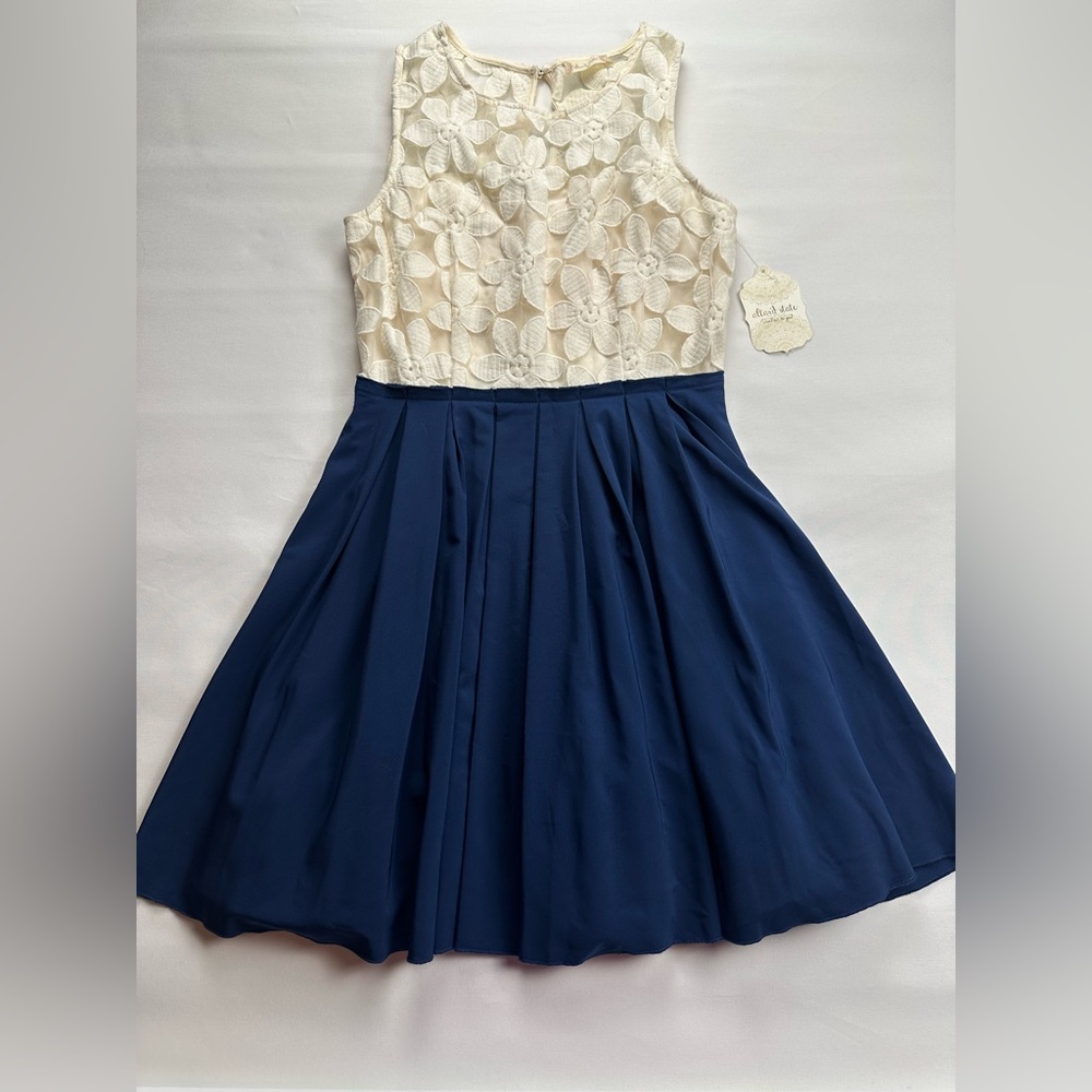 NWT Altar’d State floral cream illusion top, navy flowy bottom. Size M